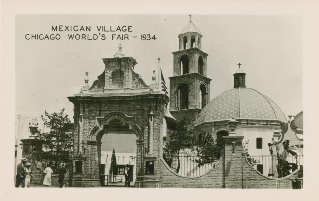 Photo of a gateway, tower, and domed building.
