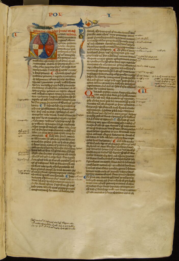 Right-hand page of handwritten Latin text in two columns with numerous notes in the margins. At the top of the left-hand column is an illuminated letter.