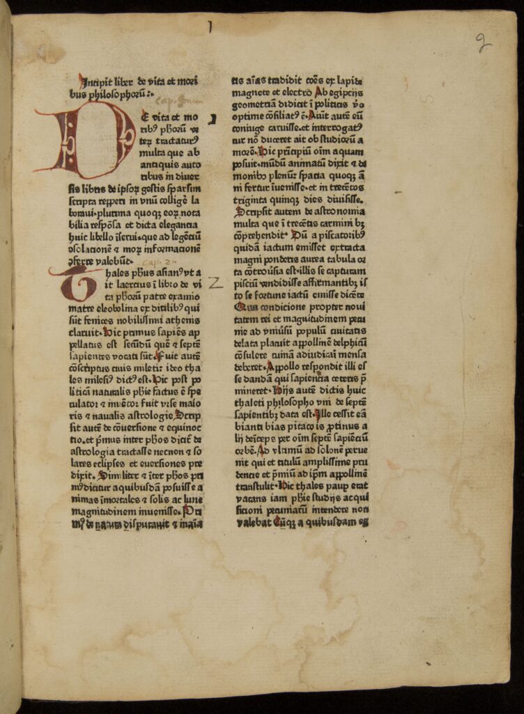 Right-hand page of text in two columns. Text is in early typeset but designed to look like a medieval scribal hand, with red hand-drawn capitals.
