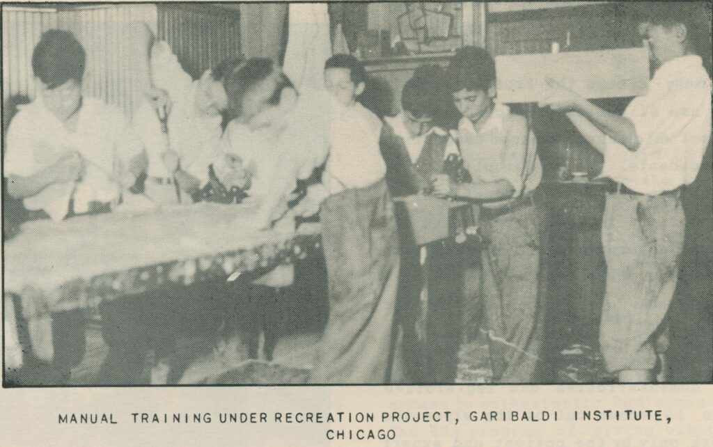 Black and white photograph of eight white boys standing around a table or plank of wood working on it with various tools.