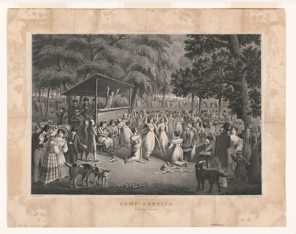 Engraving of a camp meeting. Men on a wooden, covered stage preach to a crowd while women in the crowd's center fall to their knees and or move about with their arms raised. Trees and tenets line the background.