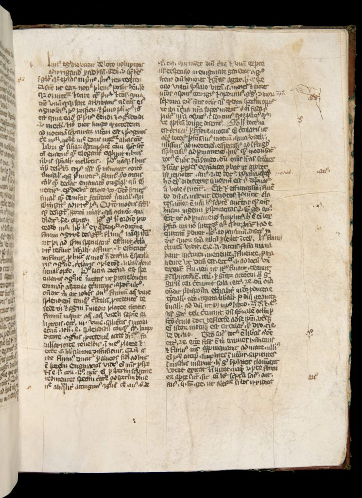 Right-hand page of handwritten text in two columns. There are notes in the right-hand margin, including some letters and a manicule (pointing hand).