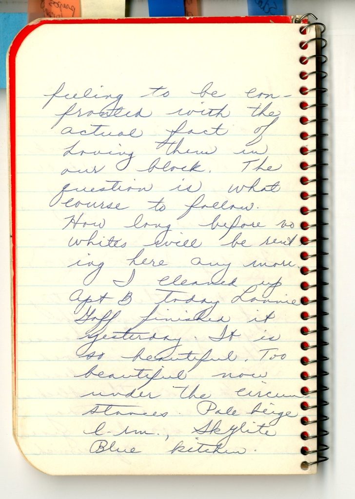 Single left-hand page of small spiralbound notebook with blue cursive writing. The entry on this page describes the author's fear that all white residents will move out of the neighborhood if African American residents start moving in.
