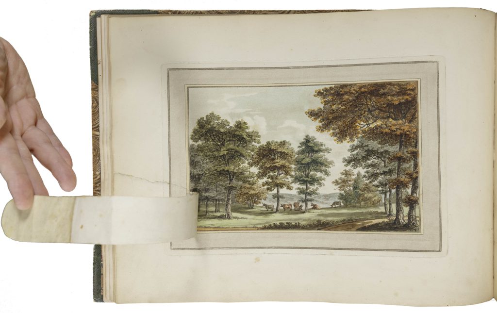 A colored drawing of a lightly wooded pastoral landscape. Cows graze in the middle distance. There are no people. To the left of the image, a hand holds open a flap of paper that otherwise would show a fence running across the base of the image with three white people in period clothing walking along it.
