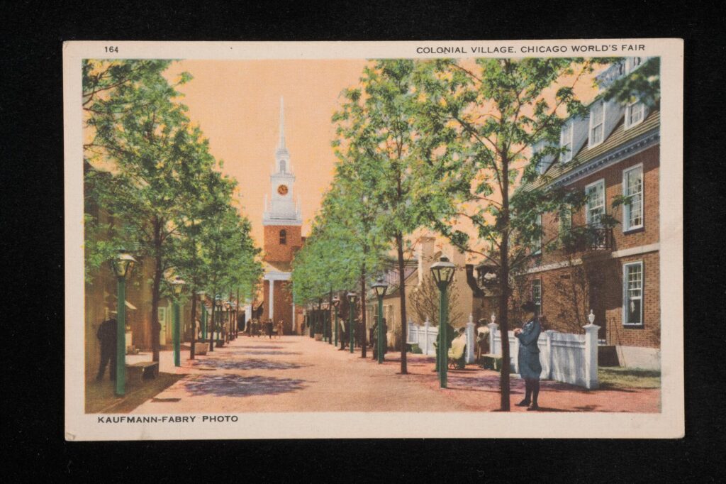 Print of a painting of a tree lined street with a red brick colonial-style building with a white clock tower in the background. People walk on the road, some of them in colonial-era clothing